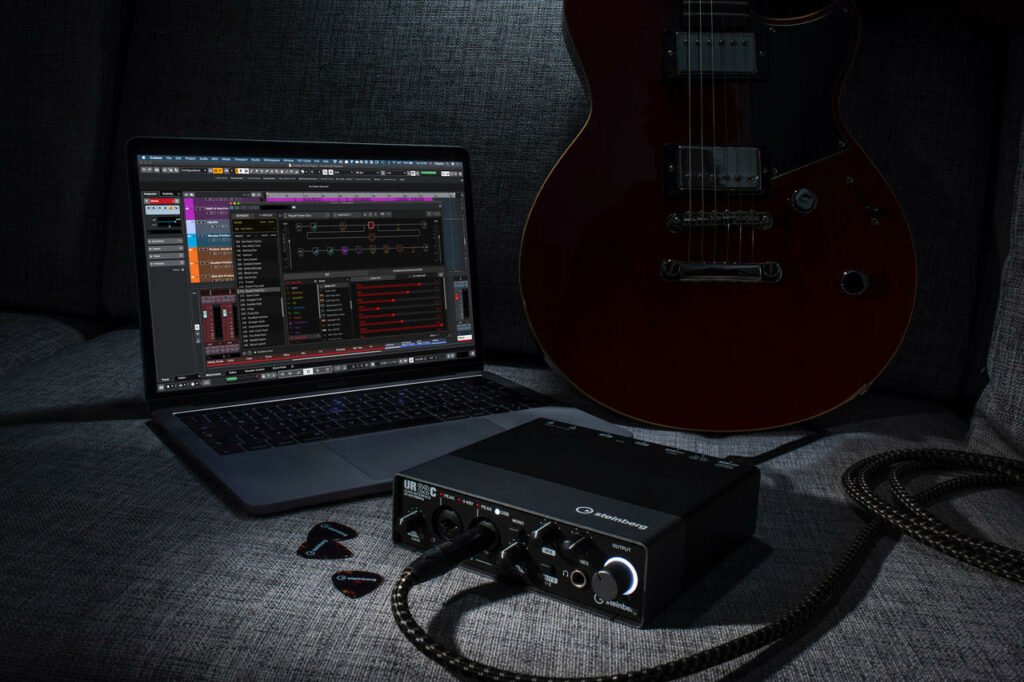 Laptop, guitar and audio interface